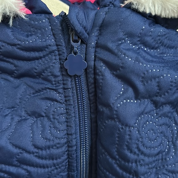 Brand new textured blue winter coat with bows and fur lined hood. - Picture 2 of 4